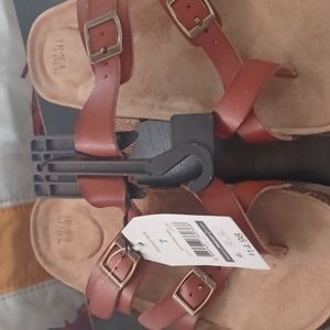 Footed leather sandles.